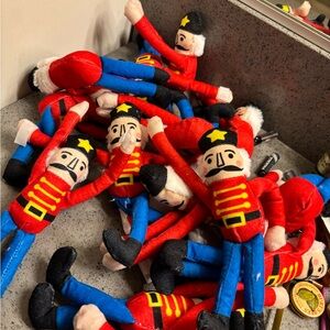 16 Nutcracker Soldier Plush Toy - Red, Blue, Black with Velcro hands.